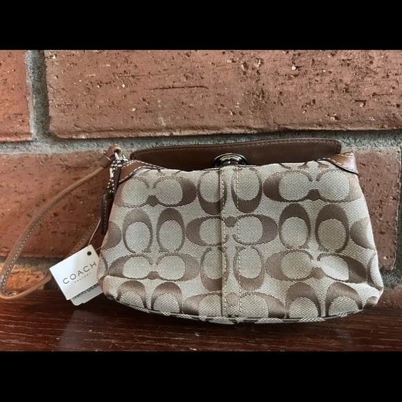 Coach Handbags - Brown Coach Signature Logo Canvas Wristlet